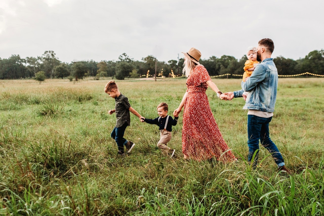 family walking through the fields