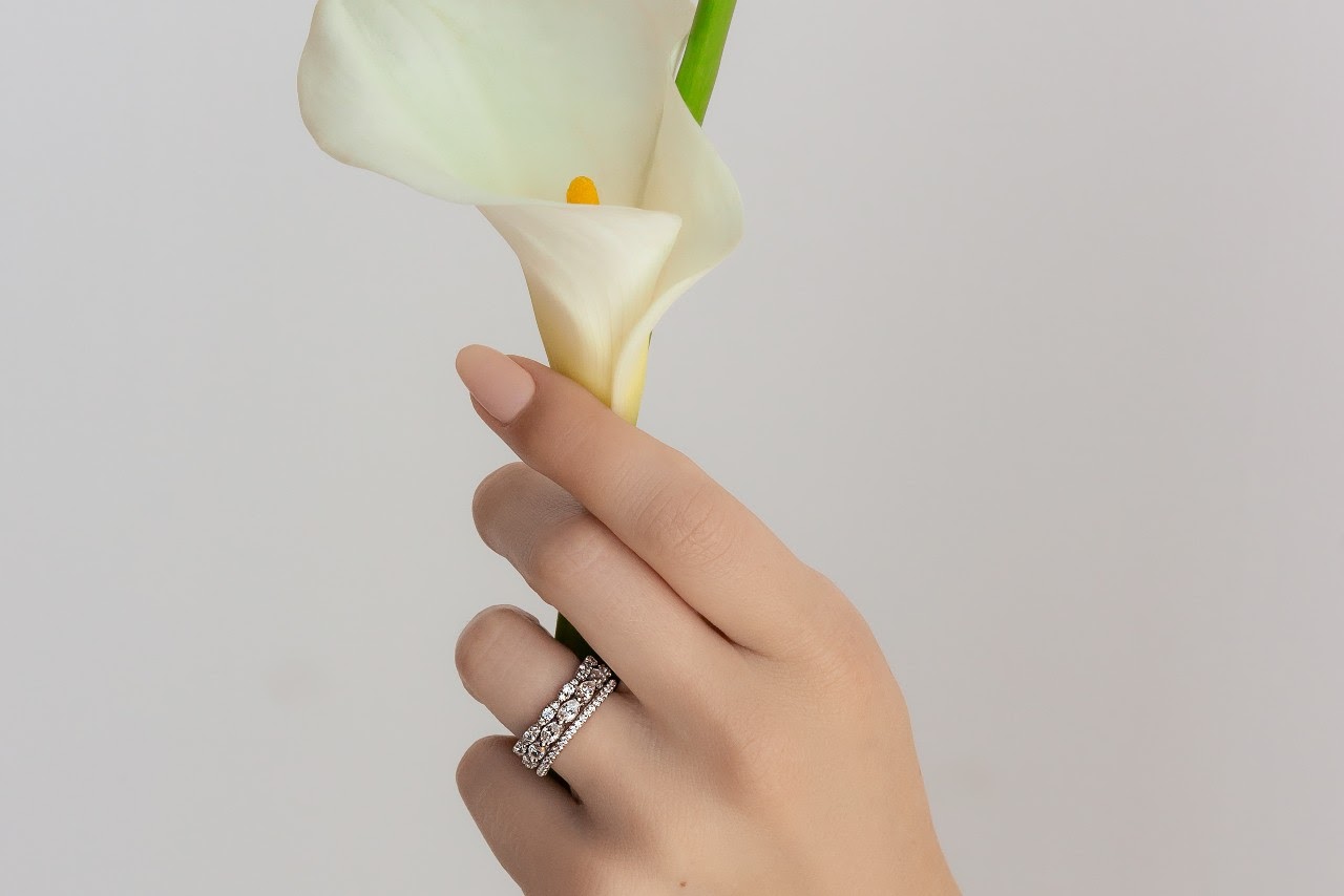 ring while holding flower