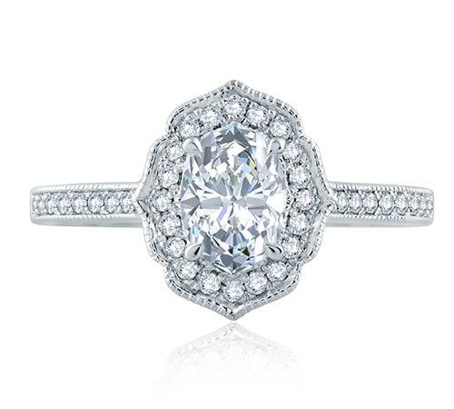 Art Deco-inspired engagement ring with a fantastic floral halo setting and oval cut diamond center stone