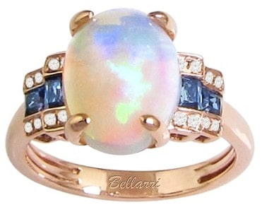 Rose gold fashion ring with a pearl center stone surrounded by sapphires and diamonds