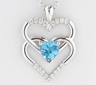 Heart pendant with blue topaz and diamonds
