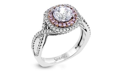 Engagement ring with a pink diamond halo