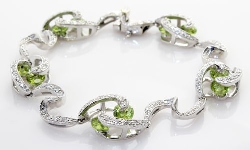 A peridot bracelet from Yael Designs features white gold and diamonds