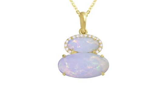 A yellow gold pendant necklace featuring two oval shaped opals and diamond accents
