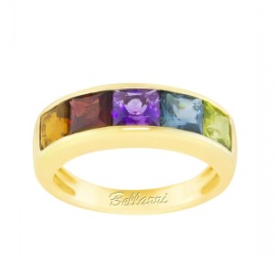 A gemstone band by Bellarri set in yellow gold.